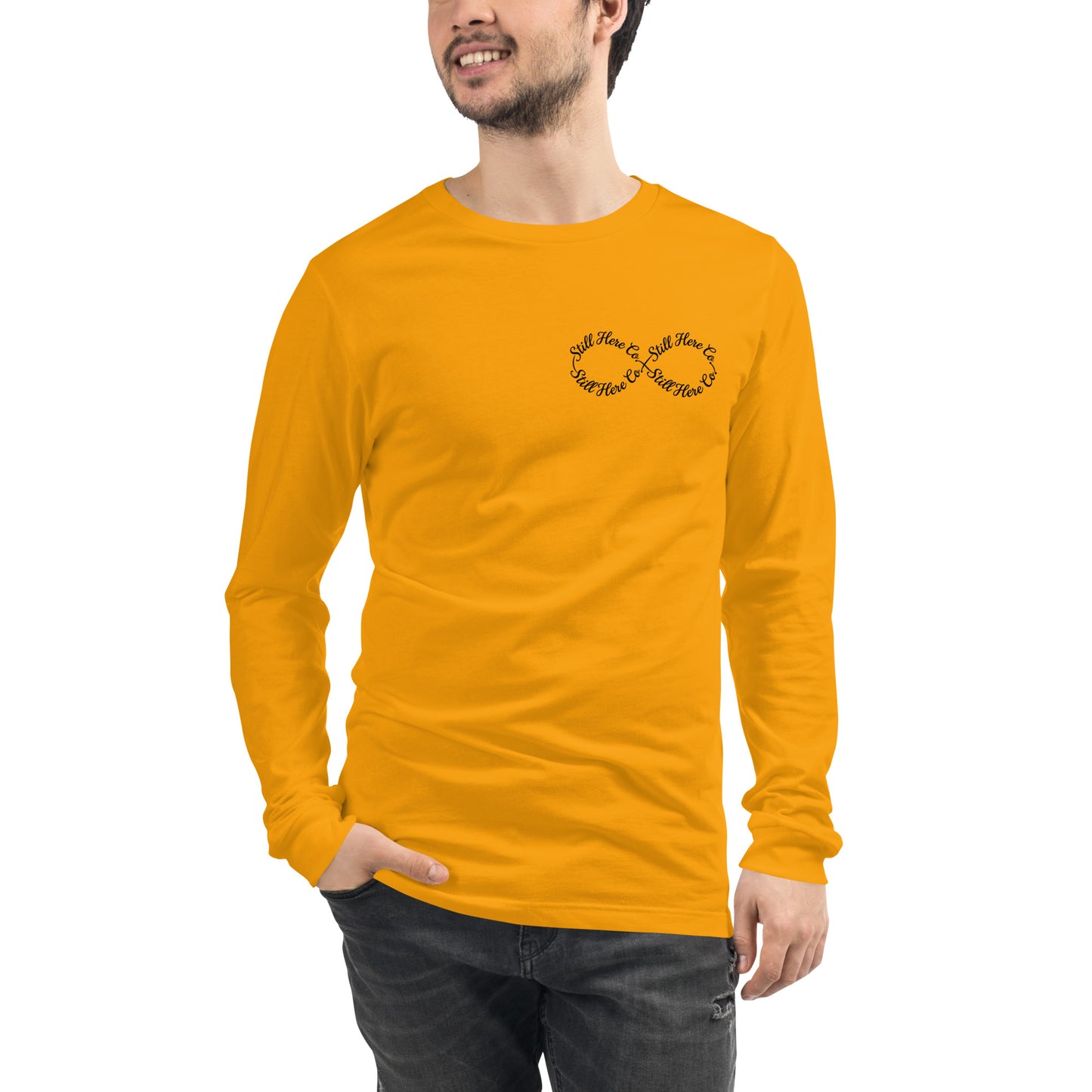 Still Here Co. long sleeve tee in gold — 'Still Here' infinity chest design